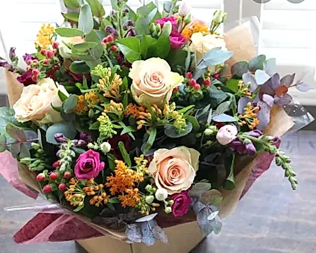 Buy hand tied bouquet of flower wrapped tissue paper delivery UK