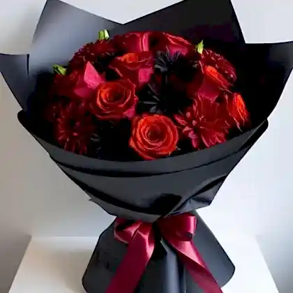 Elegant red rose black wrap bouquet with premium fresh roses, perfect for gifting.