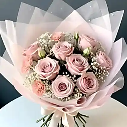 Pink Roses and Carnations Hand-Tied Bouquet with lush green foliage